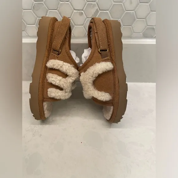 UGG Slide Slippers Chestnut kids size 9.
