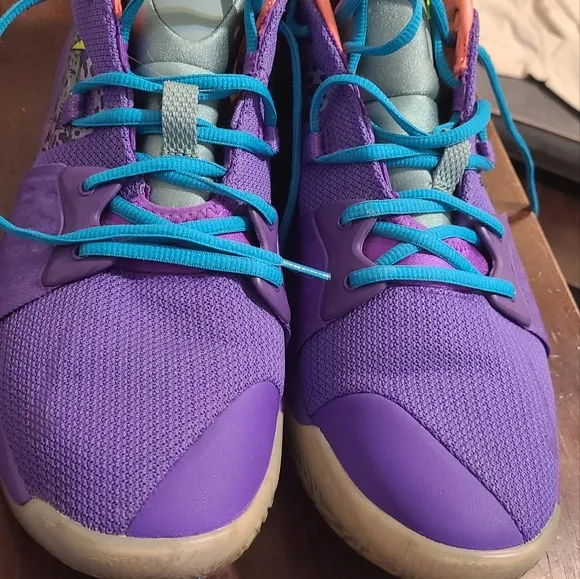 Vibrant Purple Athletic Shoes with Neon Accents