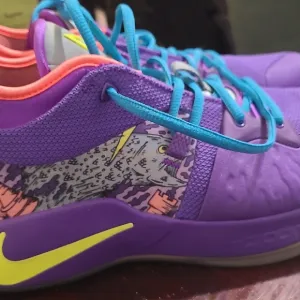 Vibrant Purple Athletic Shoes with Neon Accents